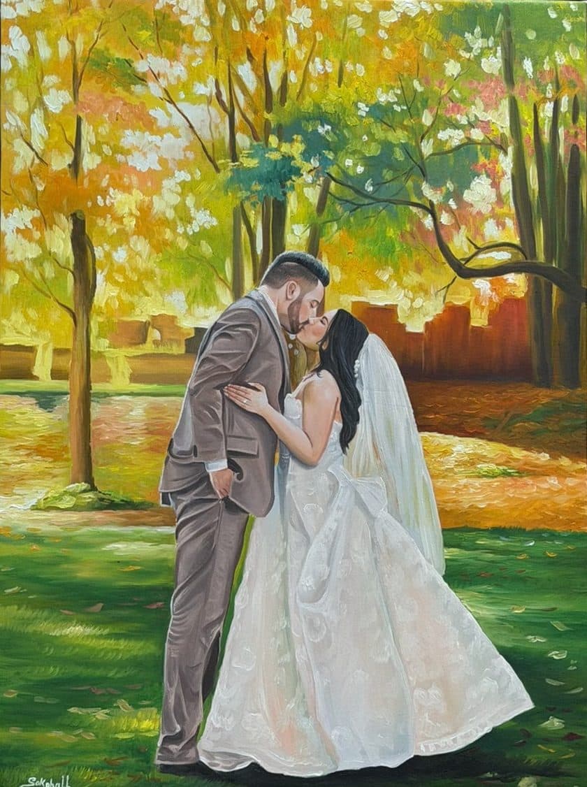 Wedding portrait painting: a bride and groom kissing beneath autumn trees, hand-painted in oil on canvas from the couple's photograph.